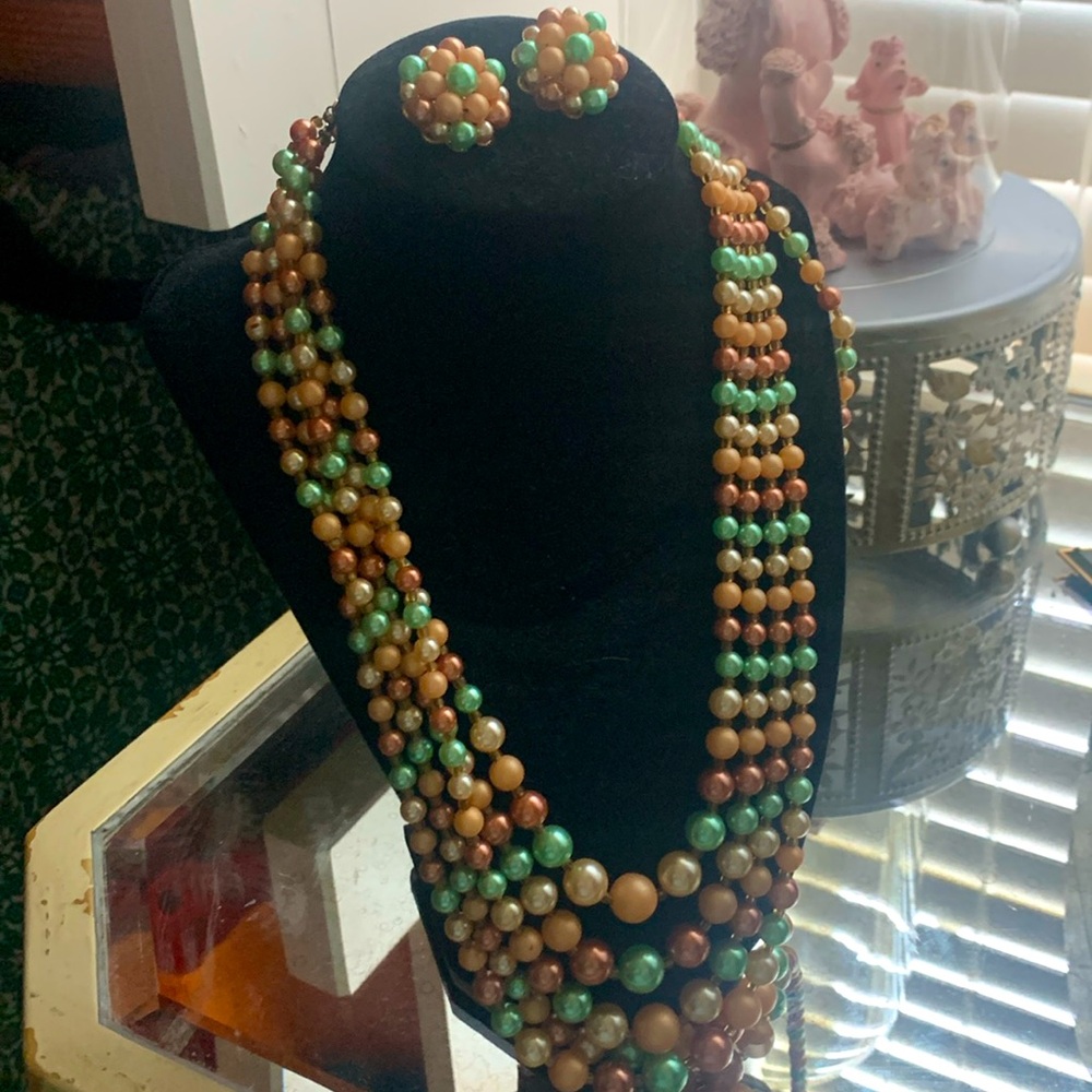 Vintage 1950-60s costume jewelry necklace and earrings set.